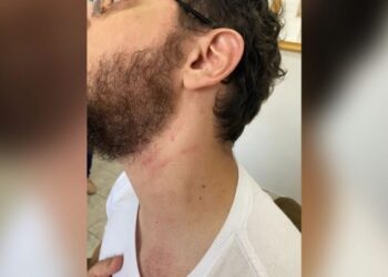 Delegado entra armado na escola do filho e agride professor